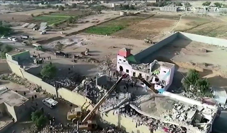 An image grab from a handout video from Yemen's Huthi rebels on January 21, 2022 shows destruction at a prison in the insurgents' stronghold of Saada in northern Yemen after it was hit in an air strike leaving many dead or wounded