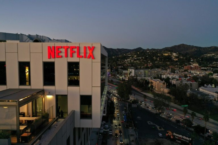Shares of Netflix sank more than 20 percent as investors recalculate valuations on companies that soared on torrid growth earlier in the pandemic