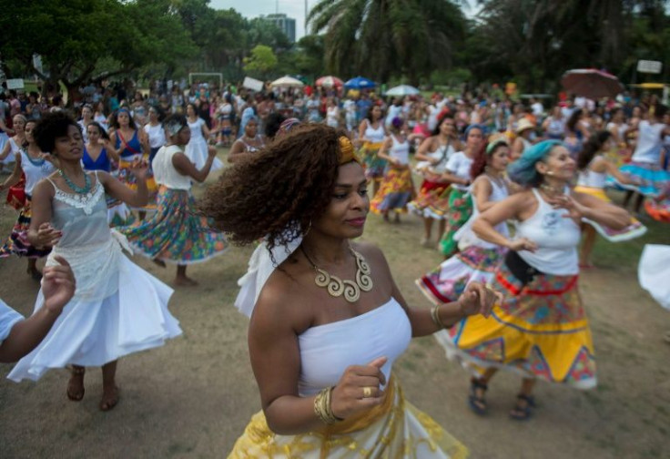 In this file photo taken on January 21, 2018, members of a street carnival group perform in Rio de Janeiro, Brazil