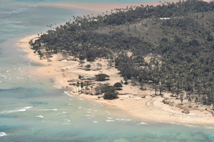 A handout photo taken on January 18, 2022 and released on January 21 by New Zealand Defence Public Affairs shows an aerial view of Mango Island following the eruption of the Hunga Tonga-Hunga Haâapai undersea volcano on a nearby island on January 15.