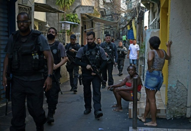 This file photo from January 19, 2022, shows members of Brazil's Civil Police taking part in a crackdown on drug trafficking in Rio de Janeiro's Jacarezinho slum district, one of two favelas targeted by the government in a major revitalization plan