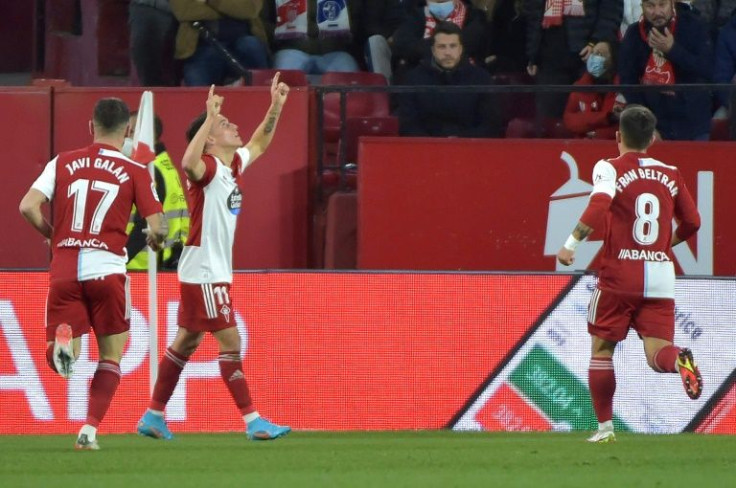 Franco Cervi (centre) opened the scoring for Celta Vigo in their 2-2 draw with Sevilla