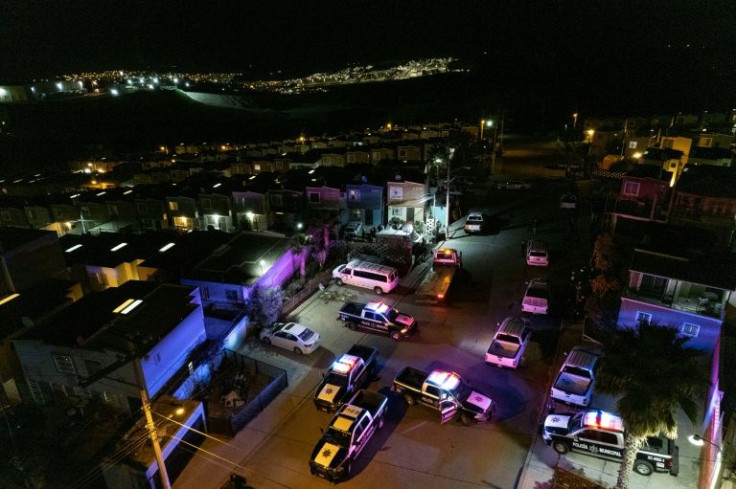 Police cars at the scene where Lourdes Maldonado Lopez was killed