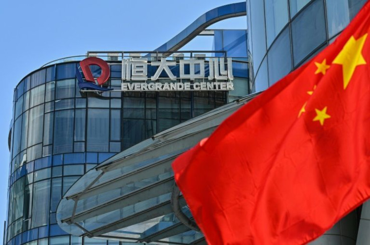 State-owned firms are expected to take over debt-laden Evergrande's assets and the company set up a risk management committee last month
