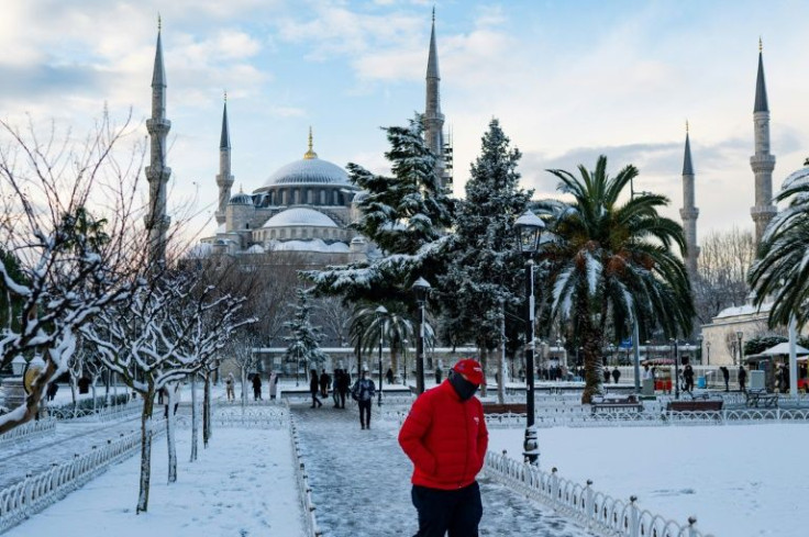 Children and tourists rejoiced after Istanbul was hit by its first snowstorm of the winter