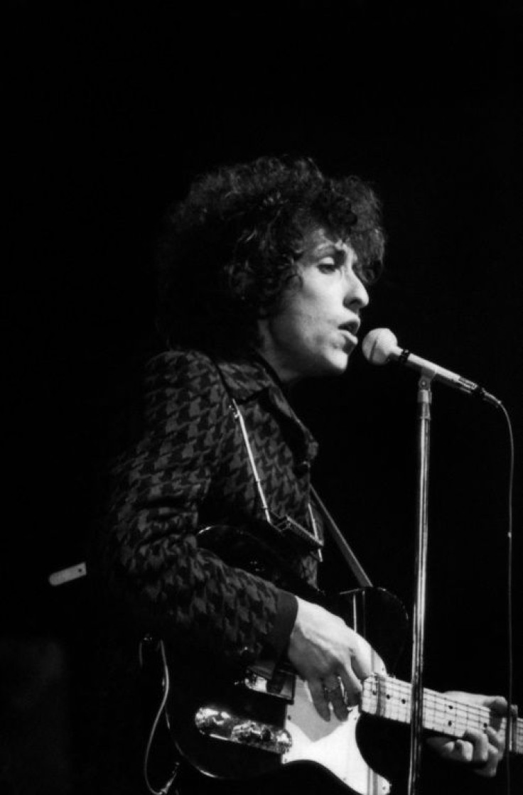 American rock and folk musician Bob Dylan, shown here on May 25, 1966, during a concert at the Olympia music hall in Paris, France
