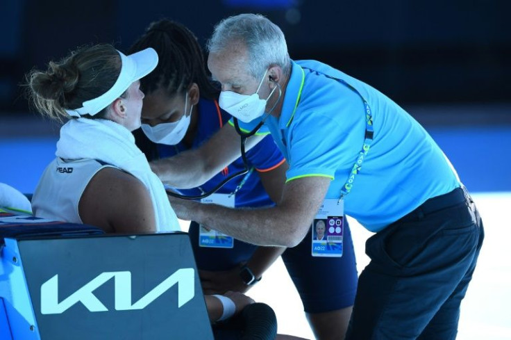 Barbora Krejcikova has her blood pressure and heartbeat checked after suffering in the heat during her quarter-final defeat to Madison Keys