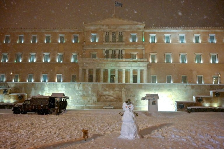 The Greek parliament in Athens suspended its session because of the unusually heavy snow