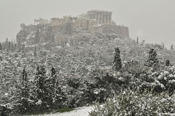 The Acropolis in Athens during heavy snowfall.