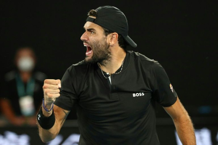 History man: Matteo Berrettini celebrates becoming the first Italian man to reach the semi-finals at the Australian Open