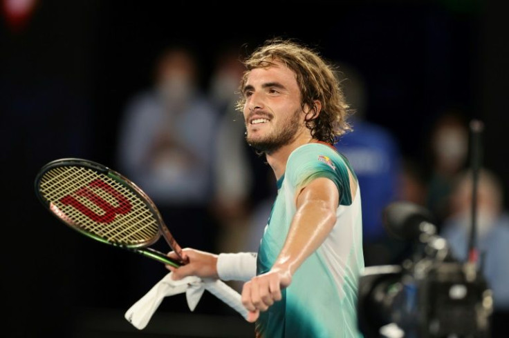 Stefanos Tsitsipas celebrates after beating Taylor Fritz over five sets