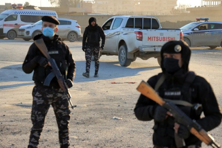 The Syrian Democratic Forces deploy around Ghwayran prison in Syria's northeastern city of Hasakeh on January 25, 2022