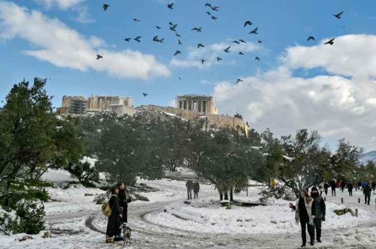 Newspaper headlines in Greece lamented a 'fiasco' and 'mistakes that brought chaos' to the snowy streets of the capital Athens