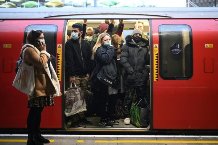 Workers are returning to the office and business is picking up, but some places such as the London Underground still require face coverings