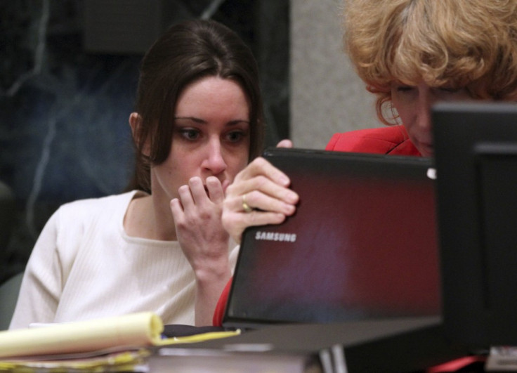 Casey Anthony sits with her defense attorney during her first degree murder trial at the Orange County Courthouse in Orlando