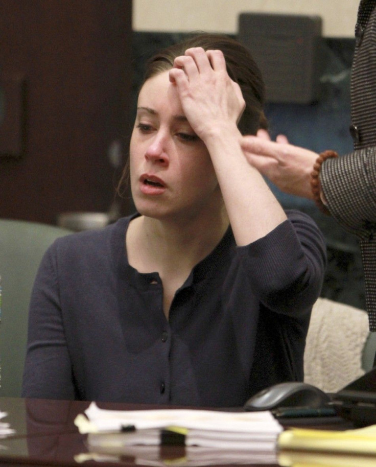 Casey Anthony tries to collect herself during a break in her murder trial at the Orange County Courthouse in Orlando Florida