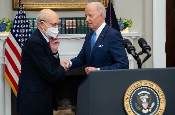 Retiring US Supreme Court Justice Stephen Breyer (L) greets President Joe Biden in the Roosevelt Room of the White House