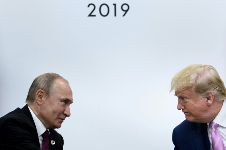 Former US president Donald Trump (right) lionized Vladimir Putin as a "highly respected" leader