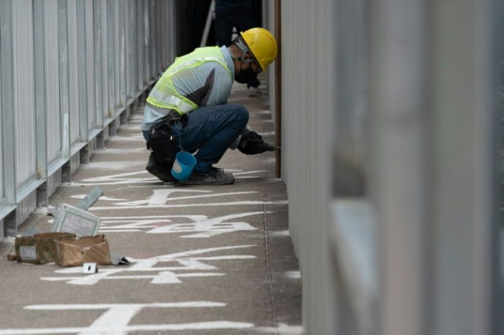 Created by HKU students shortly after the crackdown, the calligraphy birthed a campus ritual with students leaders annually repainting the words in white to symbolise mourning