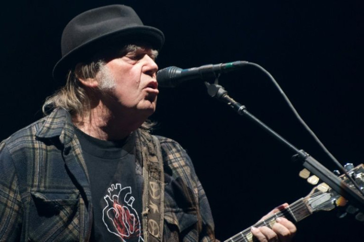 Neil Young demanded Spotify remove his music or drop podcaster Joe Rogan after a call from medical professionals to prevent Rogan from promoting 'several falsehoods about Covid-19 vaccines'