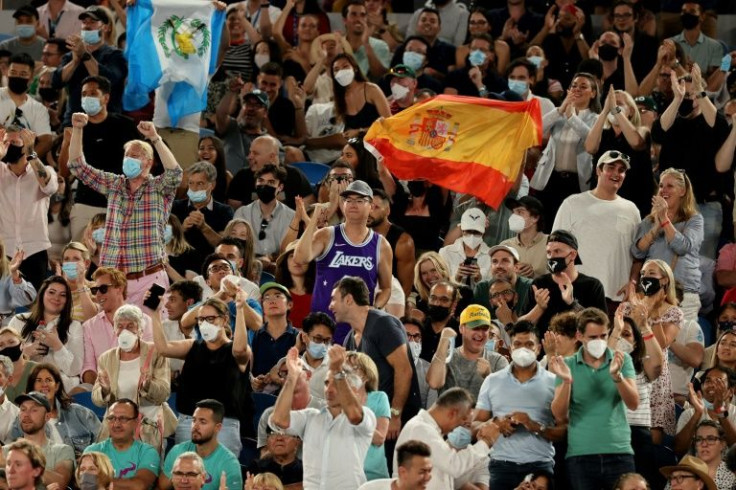 Tennis fans wave a Spanish flag during the men's singles final between Rafael Nadal and Daniil Medvedev