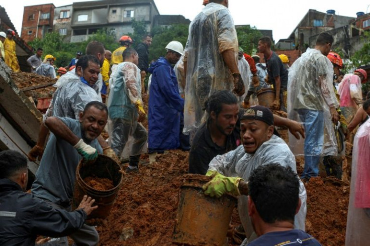 Floods and landslides triggered by torrential rains have killed at least 24 people, including eight children, in the state of Sao Paulo, Brazil's industrial hub and home to 46 million people