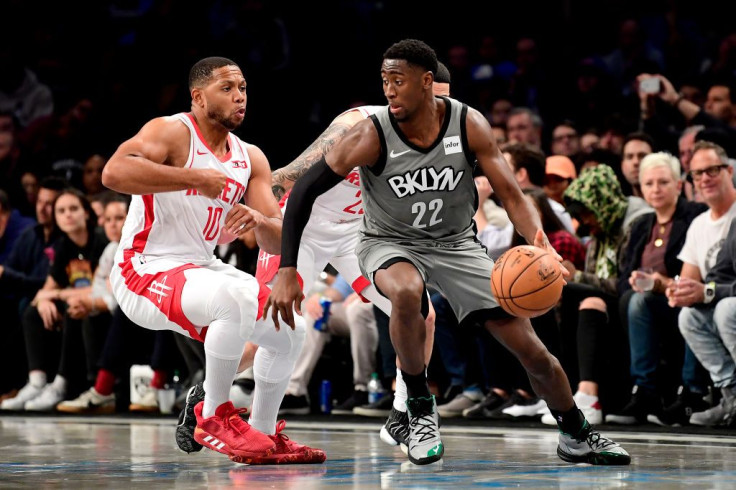  Caris LeVert #22 of the Brooklyn Nets is defended by Eric Gordon #10 of the Houston Rockets