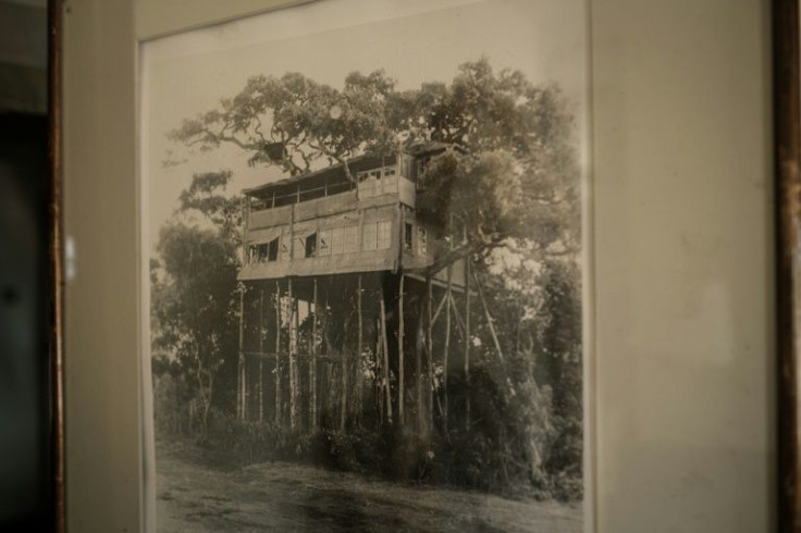 A photo on the wall shows the original tree house where Britain's Queen Elizabeth II of England stayed the night her father, the King, died and became Queen in 1952, at Treetops Lodge in Aberdare Narional Park in Nyeri, Kenya