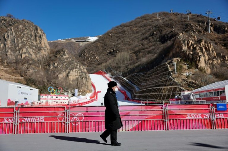 A member of security walks at the Yanqing National Alpine Ski Centre outside Beijing
