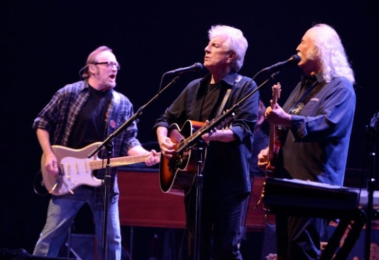 Musicians Stephen Stills, Graham Nash and David Crosby of Crosby, Stills and Nash, shown here in 2012, are making moves to pull their music from Spotify in solidarity with Neil Young