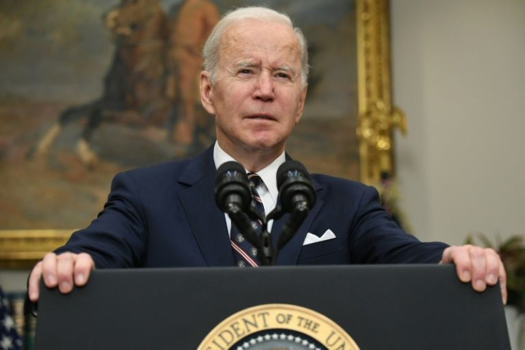 President Joe Biden said a global 'terrorist threat' was removed when the head of the Islamic State group blew himself up after a US special forces raid in Syria