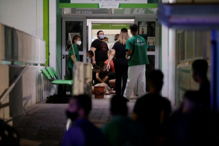 People desperate for news about their loved ones hospitalized after consuming laced cocaine