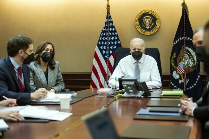 In this image released by The White House, US President Joe Biden and Vice President Kamala Harris watch the US raid in Syria from the Situation Room
