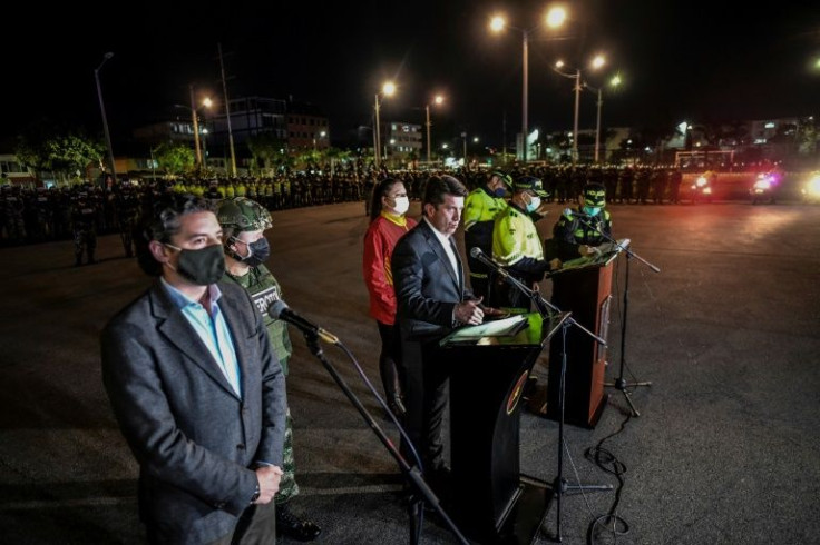 Colombian Defense Minister Diego Molano (C) speaks during a presentation of members of the National and Military Police in Bogota on September 15, 2021