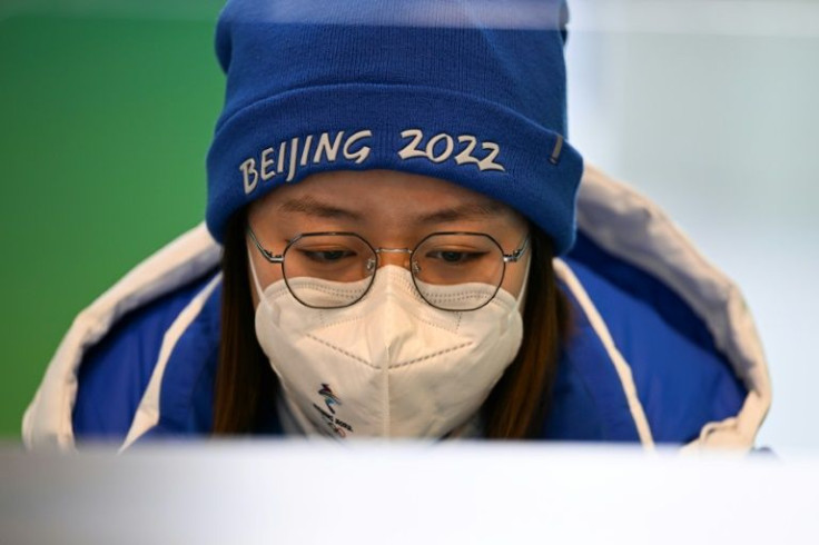 Everyone inside the Beijing Olympics 'bubble' is tested daily for Covid-19 and must wear a mask at all times