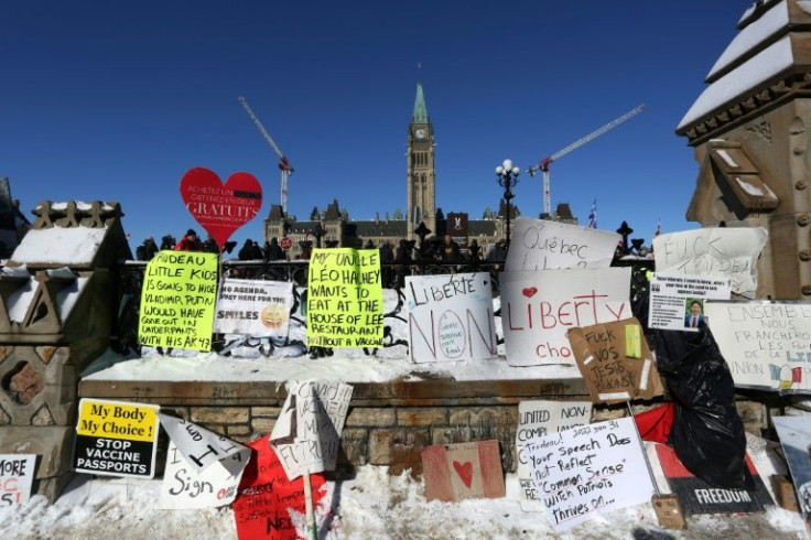 Signs opposing Covid-19 restrictions covered an area of Ottawa's Parliament Hill