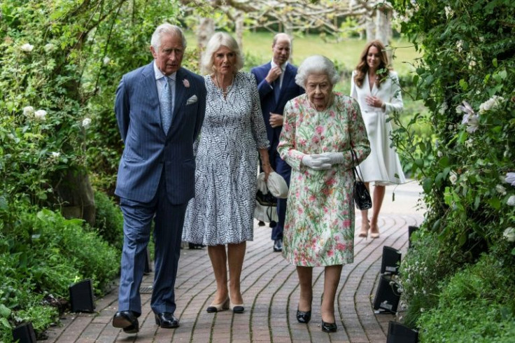 Britain's Queen Elizabeth II (R) has said she wanted Camilla (C), the wife of her heir Prince Charles (L), to ultimately be known as Queen Consort
