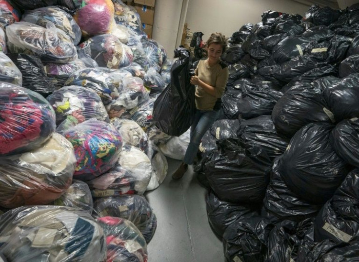 Associations like Fabscrap in New York help the fashion industry recycle unused materials, as some countries like France adopt anti-waste laws that prohibit destroying and throwing out unsold goods