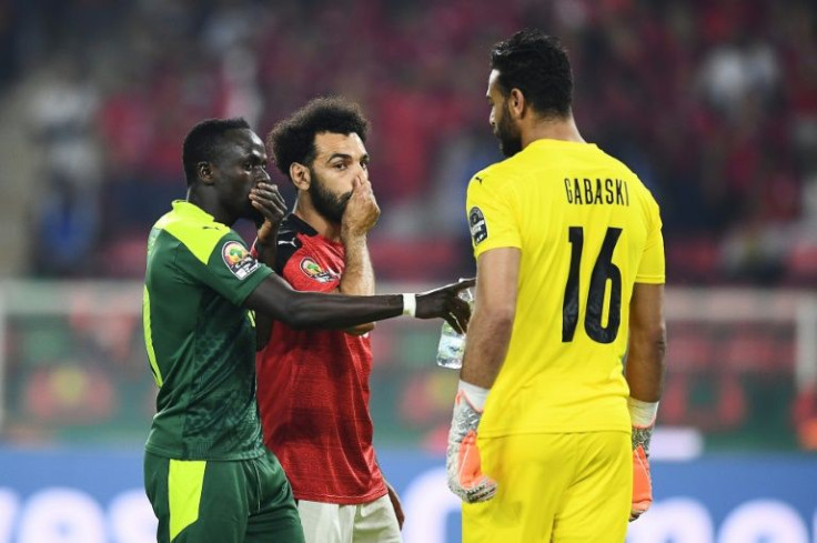 Sadio Mane and Mohamed Salah with Egypt goalkeeper Mohamed Abou Gabal
