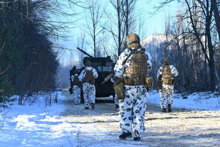 Servicemen take part in a joint tactical and special exercises of the Ukrainian Ministry of Internal Affairs, the Ukrainian National Guard and Ministry Emergency in a ghost city of Pripyat, near Chernobyl Nuclear Power Plant