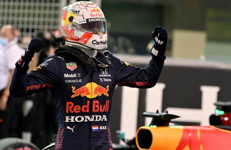 Champion: Red Bull's Dutch driver Max Verstappen celebrates his 2021 title in Abu Dhabi