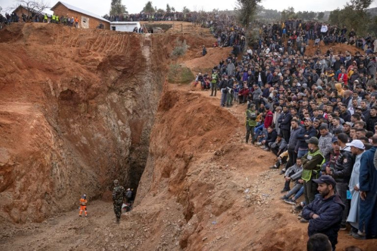 Crowds conveged on the site to watch the rescue operation, offering songs of support and prayers to the workers