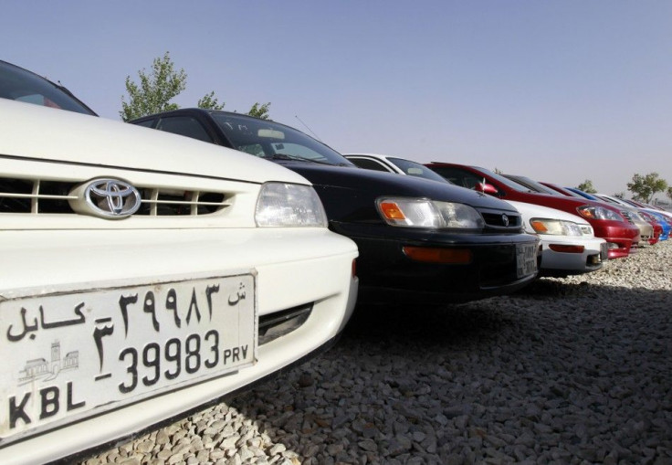 Cars are parked at a car selling lot in Kabul