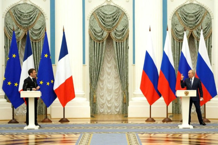 Russian President Vladimir Putin (R) said French leader Emmanuel Macron had presented several ideas worth studying