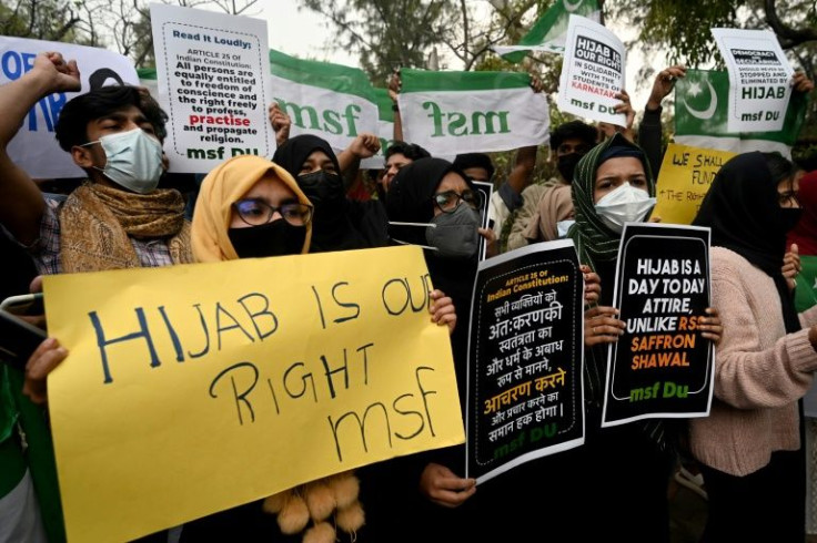 Activists held a demonstration in New Delhi to protest after students at government-run high schools in India's Karnataka state were told not to wear hijabs