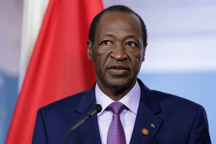 Campaore, pictured during a visit to Washington in 2014, is being tried in absentia for the assassination of his predecessor, Thomas Sankara