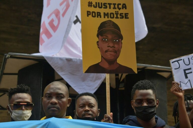 People calling for justice during a February protest against the murder of 24-year-old Congolese refugee Moise Kabagambe in Sao Paulo, Brazil