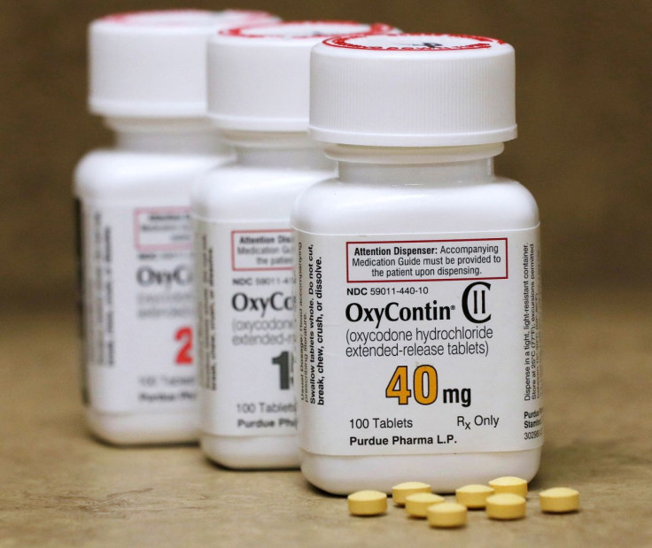 Bottles of prescription painkiller OxyContin pills, made by Purdue Pharma LP sit on a counter at a local pharmacy in Provo, Utah, U.S., April 25, 2017. 