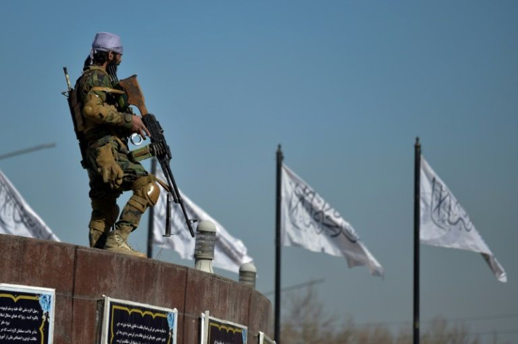Armed Taliban soldiers guard protests in Afghanistan where dissent is not tolerated