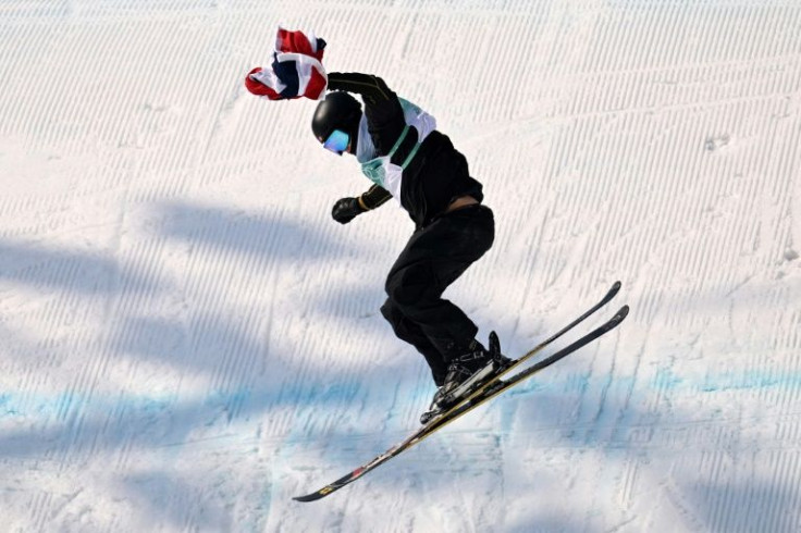 Birk Ruud competed with a Norwegian flag in his hand